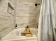 Relaxing bathtub with tiled wall and niche offers a spa-like experience at 3151 Soaring Gulls Dr # 1023, Las Vegas, NV 89128