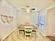 Bright dining room featuring a ceiling fan and a four-chair dining set at 3151 Soaring Gulls Dr # 1023, Las Vegas, NV 89128