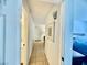 Hallway with a bathroom on the left and a bedroom entrance on the right at 3151 Soaring Gulls Dr # 1023, Las Vegas, NV 89128