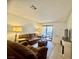 Inviting living room with plush seating and sliding glass doors to a private patio at 3151 Soaring Gulls Dr # 1023, Las Vegas, NV 89128