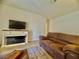 Comfortable living room with an electric fireplace and sofa at 3151 Soaring Gulls Dr # 1023, Las Vegas, NV 89128