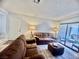 Comfortable living room with sliding glass doors leading to the outside patio area at 3151 Soaring Gulls Dr # 1023, Las Vegas, NV 89128