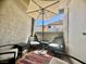Private patio area with comfortable seating, perfect for relaxation and enjoying the outdoors at 3151 Soaring Gulls Dr # 1023, Las Vegas, NV 89128