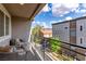 Charming balcony featuring comfortable seating and scenic neighborhood views at 3165 Via Como, Henderson, NV 89044