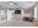 Bonus room with TV, desk, and eclectic decor providing an entertainment or office space at 3165 Via Como, Henderson, NV 89044
