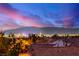 Striking Las Vegas city view at sunset with the mountains as a backdrop from the roof at 3165 Via Como, Henderson, NV 89044