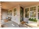 View of front porch featuring neutral decor, plants, and seating at 3165 Via Como, Henderson, NV 89044