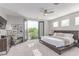 Bright and airy main bedroom with private balcony access offering scenic outdoor views at 3165 Via Como, Henderson, NV 89044
