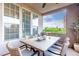 This beautiful patio comes with an outdoor dining set and views of the lush green landscape at 3165 Via Como, Henderson, NV 89044