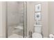 Shower featuring tiled walls and a built-in bench in a well lit bathroom at 3165 Via Como, Henderson, NV 89044