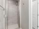 Shower stall featuring glass door and tiled walls in a modern bathroom at 3165 Via Como, Henderson, NV 89044