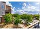 Scenic view from the balcony showcasing lush trees and a neighborhood street at 3165 Via Como, Henderson, NV 89044