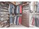 Spacious walk-in closet offers ample storage with shelving and hanging racks for clothes and shoes at 3165 Via Como, Henderson, NV 89044