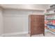 Walk-in closet with dresser and shelving perfect for shoe storage at 3165 Via Como, Henderson, NV 89044