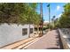 Serene backyard showcasing privacy landscaping, a rock waterfall pool, and a tranquil outdoor setting at 3341 Heavenly View Ct, Las Vegas, NV 89117