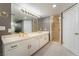 Bright bathroom with double sinks, tile floors, and framed glass shower at 3341 Heavenly View Ct, Las Vegas, NV 89117
