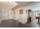 Inviting foyer with tile floors, decorative double doors, and views of the dining and living areas at 3341 Heavenly View Ct, Las Vegas, NV 89117