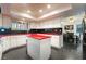 Bright kitchen featuring a center island and plentiful cabinet space at 3341 Heavenly View Ct, Las Vegas, NV 89117