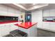 A contemporary kitchen features stainless steel appliances and white cabinetry at 3341 Heavenly View Ct, Las Vegas, NV 89117
