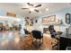 Spacious living room featuring a fireplace, built-in shelves and hardwood floors at 3341 Heavenly View Ct, Las Vegas, NV 89117