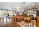 Spacious living room boasting a jukebox, pinball machine, and an adjacent backyard entrance at 3341 Heavenly View Ct, Las Vegas, NV 89117