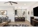 Chic entertainment area featuring a wet bar, stylish seating, and a modern design aesthetic at 352 Dandelion Brook Ct, Las Vegas, NV 89148
