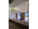 Spacious living room featuring large windows with outdoor views at 3930 University Center Dr # 702, Las Vegas, NV 89119