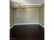 The room is equipped with dark hardwood flooring at 3930 University Center Dr # 702, Las Vegas, NV 89119