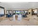 Grand community room features a stylish decor and open layout with beautiful tile flooring at 4140 Coneflower St, Las Vegas, NV 89135