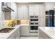 Close up of the modern kitchen showcases stainless steel appliances and sleek cabinetry at 4140 Coneflower St, Las Vegas, NV 89135