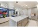 View from the kitchen features an open concept design connecting to the living room and dining area at 4140 Coneflower St, Las Vegas, NV 89135