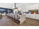 Stylish community kitchen with a large island, bar seating, and modern appliances for resident use at 4140 Coneflower St, Las Vegas, NV 89135