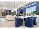 Bright living room featuring stylish decor, modern lighting and high ceilings at 4140 Coneflower St, Las Vegas, NV 89135