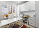 Bright office with custom built-ins, white desk, modern chair, and a sunny window at 4140 Coneflower St, Las Vegas, NV 89135