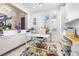 The home office is brightly lit with a modern desk, storage, and decor at 4140 Coneflower St, Las Vegas, NV 89135