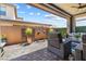 Inviting outdoor patio featuring comfortable seating and manicured landscaping at 4140 Coneflower St, Las Vegas, NV 89135