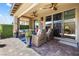 Relaxing outdoor patio with comfortable furniture and elegant decor, perfect for entertaining at 4140 Coneflower St, Las Vegas, NV 89135