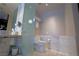 Modern bathroom design with marbled tile accents and a sleek toilet at 4381 W Flamingo Rd # 3118, Las Vegas, NV 89103