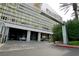 Covered entrance featuring modern design, sleek signage, and well-manicured landscaping at 4381 W Flamingo Rd # 3118, Las Vegas, NV 89103