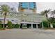 Stunning exterior view of the Palms Place building with lush landscaping and entrance at 4381 W Flamingo Rd # 3118, Las Vegas, NV 89103