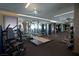 Well-equipped gym with weightlifting equipment, mirrors, and ample workout space at 4381 W Flamingo Rd # 3118, Las Vegas, NV 89103