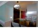 Stylish kitchen with a breakfast bar, stainless steel fixtures, and modern lighting at 4381 W Flamingo Rd # 3118, Las Vegas, NV 89103