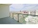 A spacious balcony with a glass railing offers panoramic city views, showcasing the urban landscape at 4381 W Flamingo Rd # 3616, Las Vegas, NV 89103