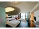 Luxurious bedroom/living room combination with a plush bed, sofa, and expansive windows at 4381 W Flamingo Rd # 3616, Las Vegas, NV 89103