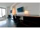 This room features a large workspace with custom shelving, a stylish chair, and a bright lamp at 4381 W Flamingo Rd # 3616, Las Vegas, NV 89103