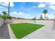 A spacious backyard features a pool and grassy yard at 4508 Rip Van Winkle Ln, Las Vegas, NV 89102
