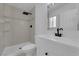 Bright bathroom features a walk-in shower and updated vanity at 4508 Rip Van Winkle Ln, Las Vegas, NV 89102