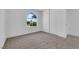 Neutral carpet in a well-lit bedroom with closet at 4508 Rip Van Winkle Ln, Las Vegas, NV 89102