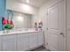 Contemporary bathroom featuring a spacious vanity, ample storage, and a bright, clean design at 48344 Orchid Ridge Ave # 104, Las Vegas, NV 89141