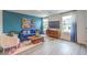 Bright living room featuring modern furniture and stylish decor for comfortable living at 48344 Orchid Ridge Ave # 104, Las Vegas, NV 89141